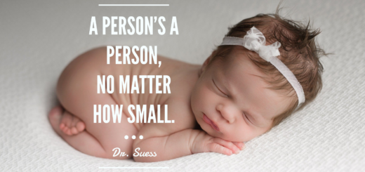 Cute newborn baby girl with a headband sleeping on a soft blanket for Agape Ministry image SEO.