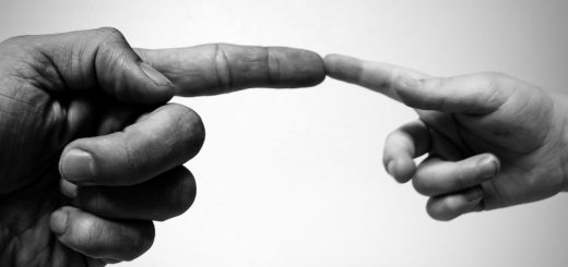 Hands reaching out, symbolizing compassion and faith, representing Agape Ministry's mission of love and service.